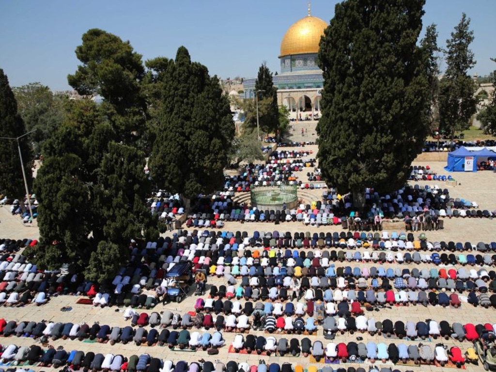 Muslims pray in front of the Dome of the Rock during the holy month of Ramadan in Jerusalem's Old City on April 16, 2021. Picture: Muammar Awad/Xinhua via Getty