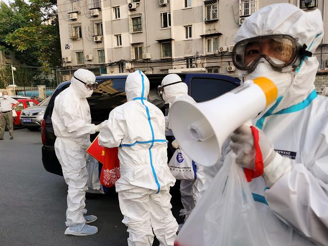 Authorities near the Xinfadi food Market in Beijing. Picture: Getty