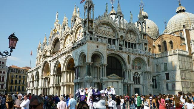 Photographing St Mark’s Basilica in Venice ended badly for one Australian tourist who ran up a $42,000 medical bill after breaking a leg. Picture: Andy Toulson