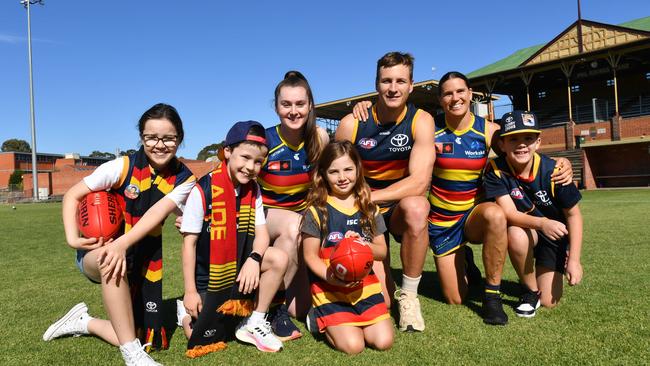 Adelaide players Sarah Allan, Jordan Dawson and Chelsea Randall with Crows fans at Thebarton Oval. Picture: Keryn Stevens