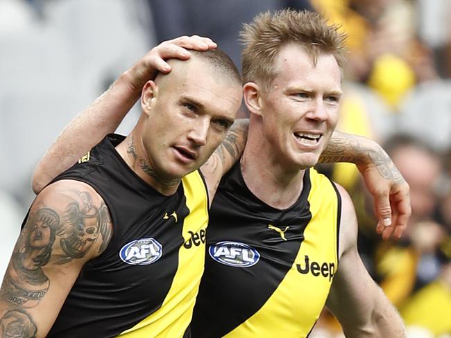 MELBOURNE, AUSTRALIA - MARCH 28: Dustin Martin and Jack Riewoldt of the Tigers celebrate a goal during the round 2 AFL match between the Hawthorn Hawks and the Richmond Tigers at Melbourne Cricket Ground on March 28, 2021 in Melbourne, Australia. (Photo by Darrian Traynor/Getty Images)