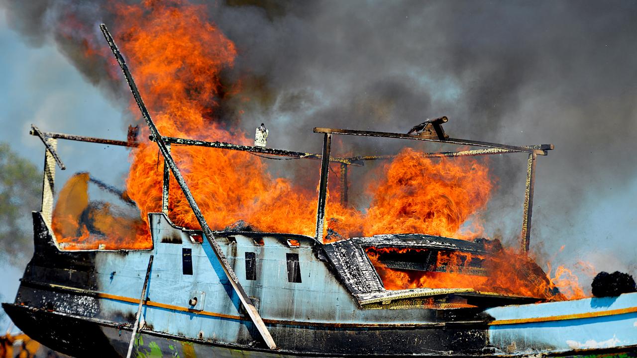 An illegal foreign fishing vessel caught in Australian waters is set on fire at Bhagwan Marine at East Arm. The destruction of the vessel will prevent foreign bodies and diseases from contaminating the country.