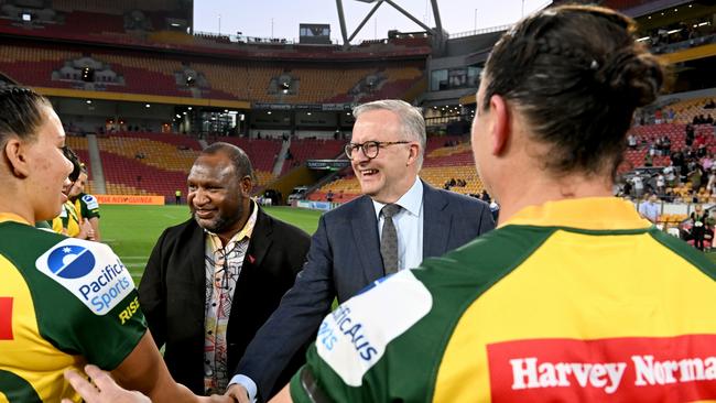 Australian Prime Minister Anthony Albanese and Papua New Guinean Prime Minister James Marape greet the players before the International match between the Australian Women's PMs XIII and PNG Women's PMs XIII at Suncorp Stadium on September 25, 2022 in Brisbane, Australia. (Photo by Bradley Kanaris/Getty Images)