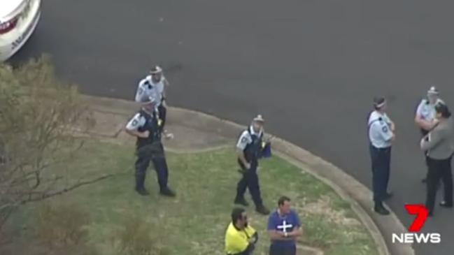 Police at the scene after the death of Anne Rogers. Picture: 7 News