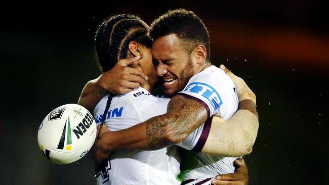 Apisai Koroisau and Steve Matai celebrate a Sea Eagles try.