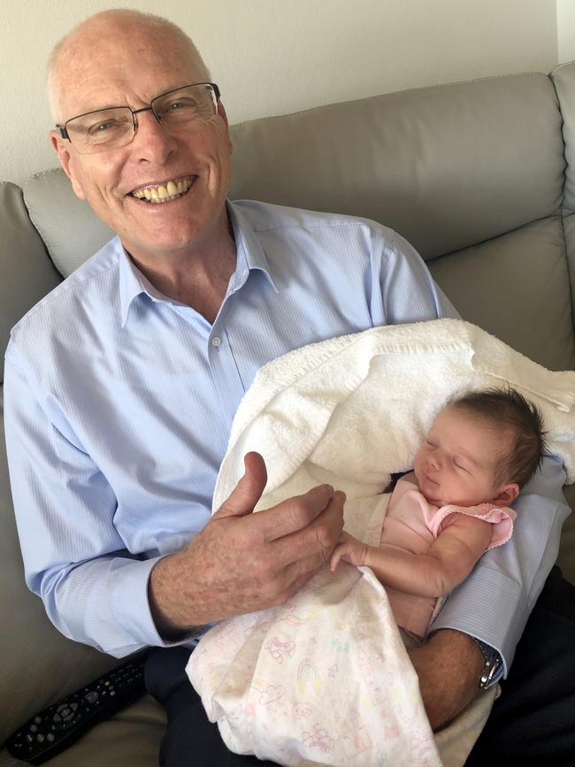 Erin’s politician dad Jim, proudly holding his granddaughter. Picture: Darren Leigh Roberts