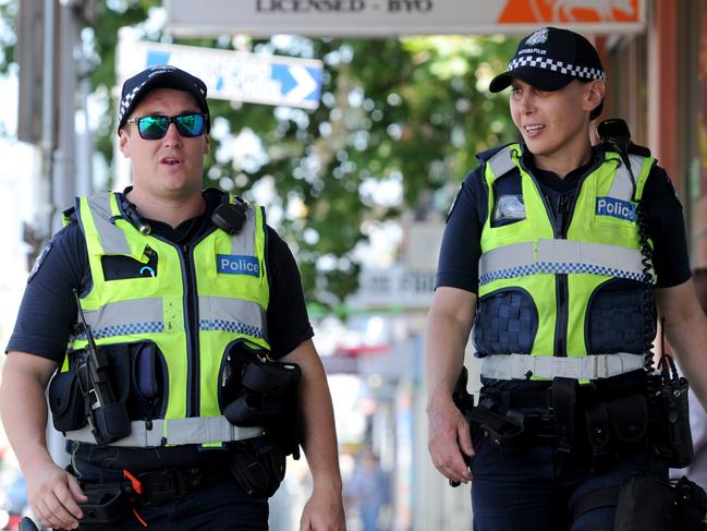 Police patrol Victoria Street Richmond as part of Operation Apollo. Picture: Andrew Henshaw