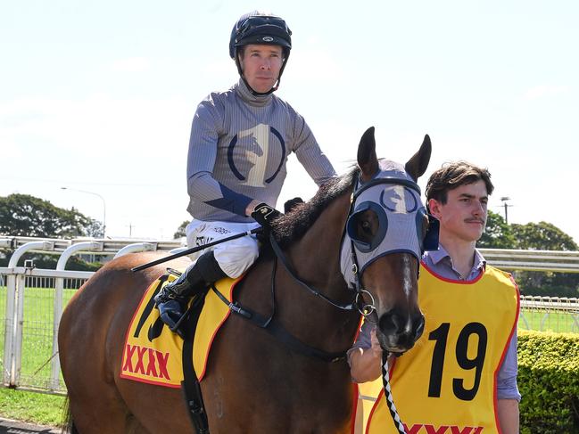 Ronnie Stewart rounds out a winning double at Doomben aboard Hell. Picture: Grant Peters - Trackside Photography