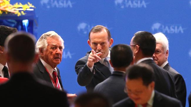 Hawke and then-PM Tony Abbott attend the Boao Forum for Asia Annual Conference in China in 2014. Hawke had a high regard for Abbott personally, but called him a “bloody hopeless” prime minister.