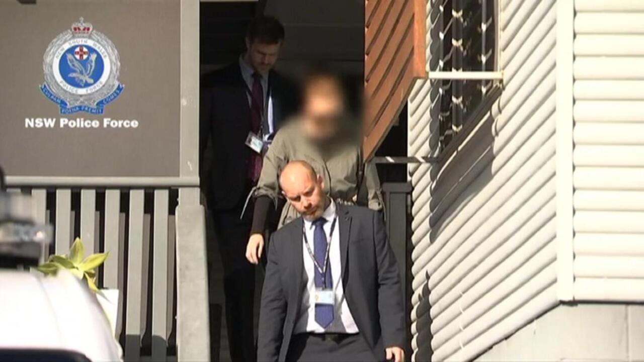 NSW prison guard charged over alleged prisoner affair