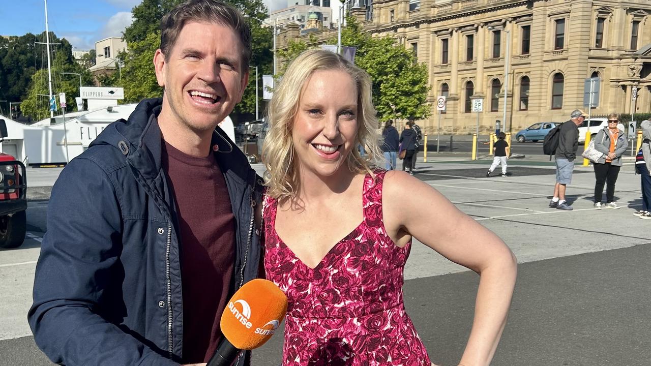 Sunrise weatherman Sam Mac with Salamanca Market Stallholder Association president Emma Hope. Picture: Emma Hope.