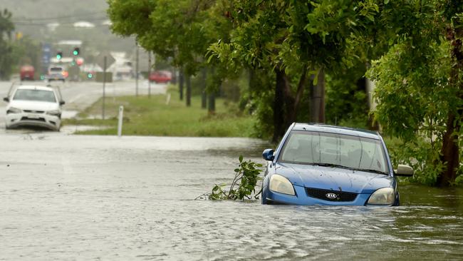 A car underwater on Kings Road, Hyde Park on Sunday. Picture: Evan Morgan