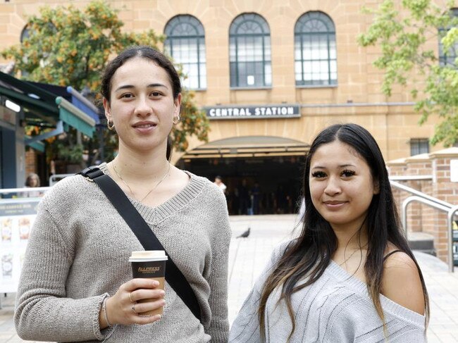 Frustrated commuters Faith Murphy and Chantelle Delacruz at Central Station this morning. Picture: Damian Shaw