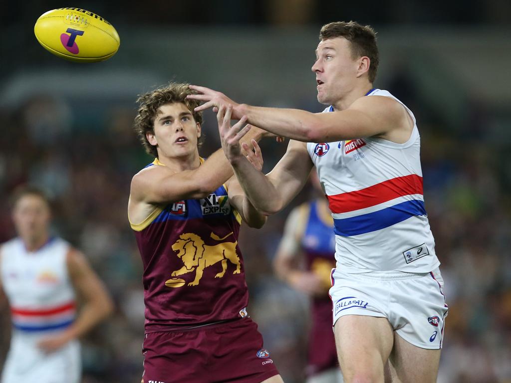 Jack Macrae (R) had 24 touches at the main break — the third biggest halftime tally of his career. (Photo by Jono Searle/AFL Photos/via Getty Images)