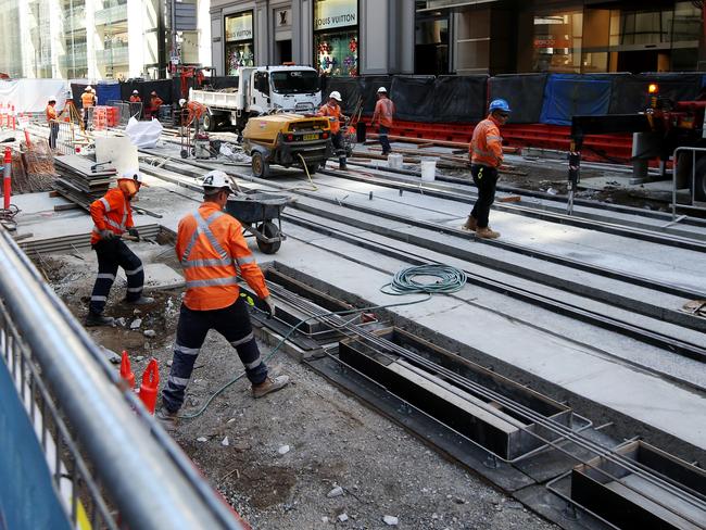 Exposed light rail lines on the corner of George St and Bathurst St