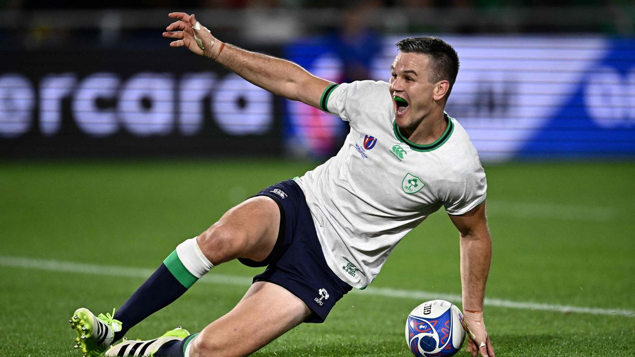 Ireland's fly-half Jonathan Sexton celebrates after scoring a try during the 2023 Rugby World Cup Pool B match between Ireland and Tonga at the Stade de la Beaujoire in Nantes, western France on September 16, 2023. (Photo by LOIC VENANCE / AFP)
