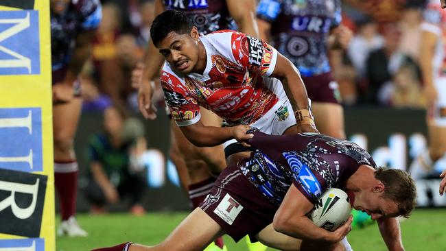 Anthony Milford tackles Daly Cherry-Evans during the round 10 NRL game between the Brisbane Broncos and Many Sea Eagles at Suncorp Stadium. Pics Adam Head