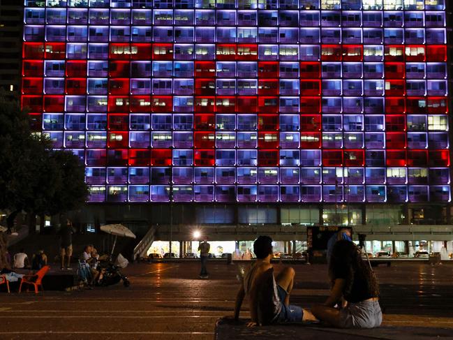 The windows of a building in Tel Aviv spell out the word 