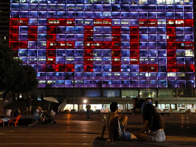 The windows of a building in Tel Aviv spell out the word "Peace" to celebrate the signing of the landmark Israeli deals with the UAE and Bahrain. Picture: AFP