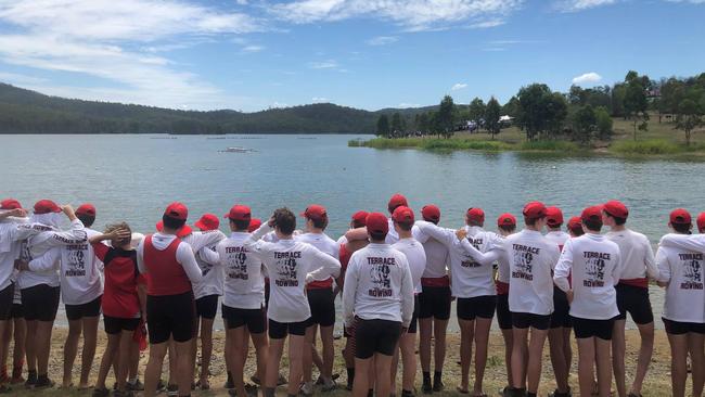 Terrace await the return of a crew during an early regatta.