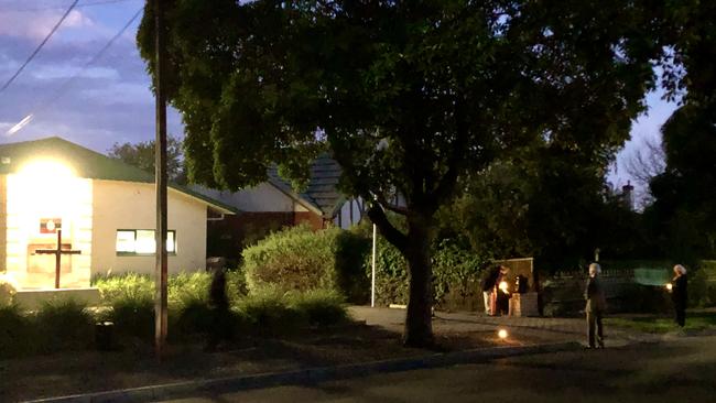 Caption: Dawn breaks at the Royal Australian Regiment Association- SA (Burnside) RSL Sub Branch, as members hold a socially distanced service. The first Dawn Service at this site was held back in 1949, so there was no way COVID-19 was going to stop commemorations. The regiment has a long and storied history dating back some 80 years, when its soldiers were first posted to the Middle East. Picture: Jackie Tracy