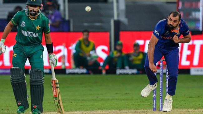 Mohammed Shami, right, bowls during the ICC Twenty20 World Cup cricket match between India and Pakistan at the Dubai International Cricket Stadium in Dubai last week. Picture: AFP