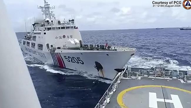 A Chinese coast guard ship collides with Philippine Coast Guard ship BRP Teresa Magbanua near the Sabina Shoal in disputed waters of the South China Sea on August 31. Picture: AFP