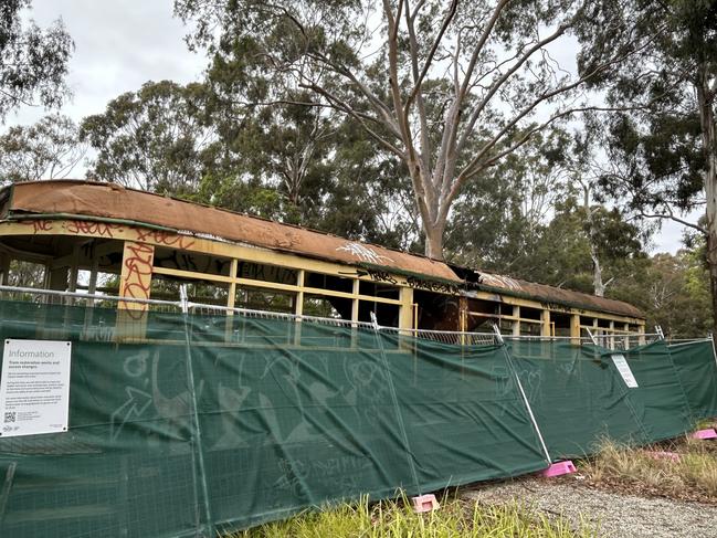 Two heritage W-Class trams have been boarded up after they were vandalised and left to rust in Wattle Park, Burwood.