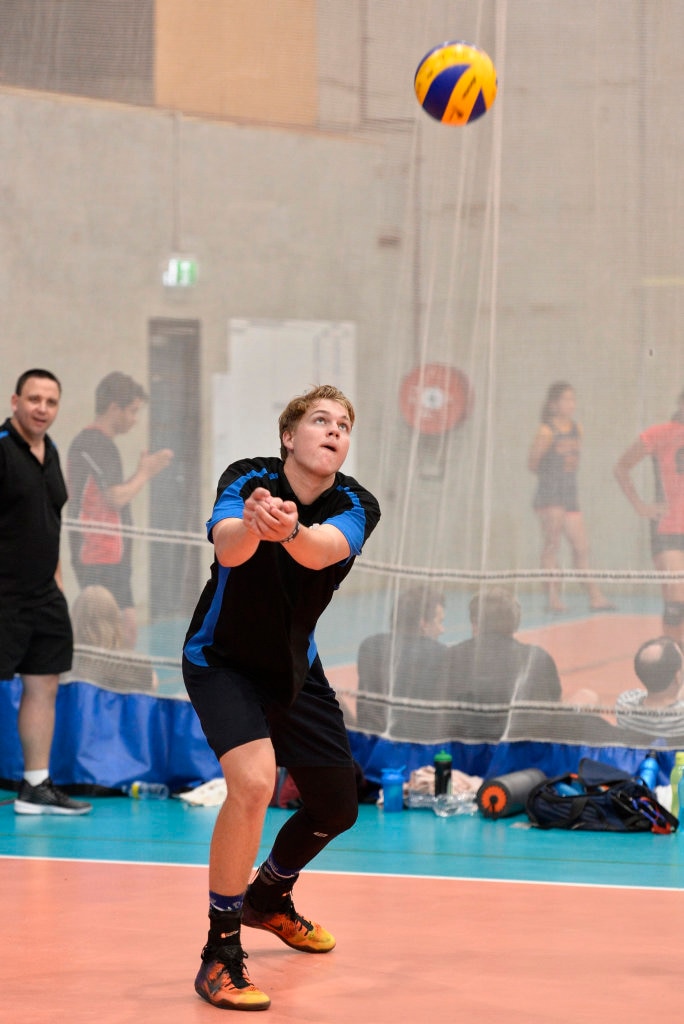 Scott Schultz of Remember the Titans against Brisbane Volleyball Club in the final of the Clash of the Titans volleyball tournament at Harristown State High School gym, Sunday, February 25, 2018. Picture: Kevin Farmer