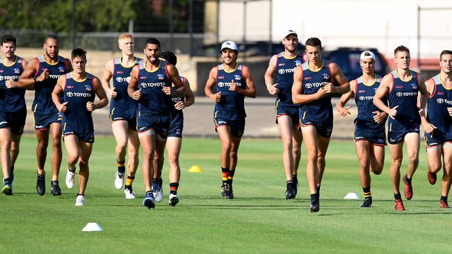 The Adelaide Crows in their return to training at Thebarton Oval on Monday. Picture: AAP Image/Mark Brake