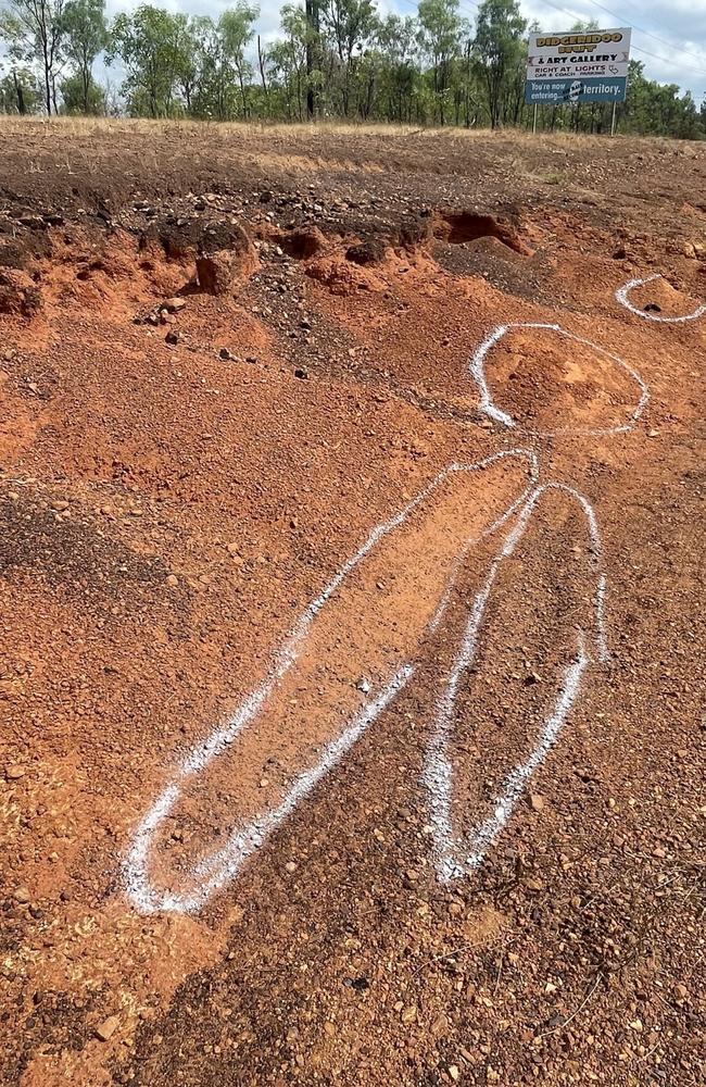 The investigation markings of a fatal motorcycle crash in Bees Creek stretch for about 100m on the side of the highway. Picture: Glenn Campbell