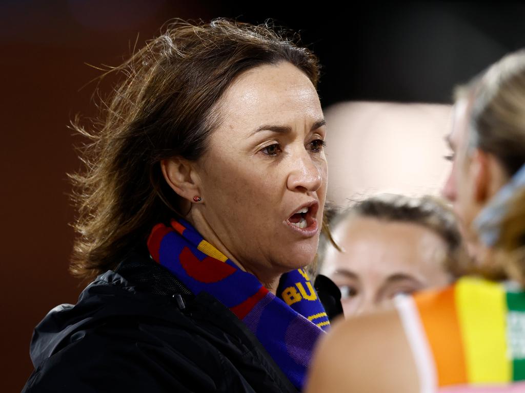 Bulldogs coach Tamara Hyett speaks to her players during their clash with Essendon. Picture: Michael Willson/AFL Photos via Getty Images.