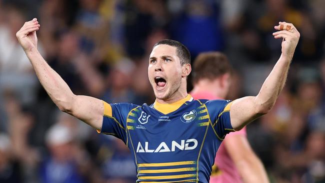 SYDNEY, AUSTRALIA – MARCH 23: Mitchell Moses of the Eels celebrates after kicking a field-goal in extra time to win the round four NRL match between the Parramatta Eels and Penrith Panthers at CommBank Stadium on March 23, 2023 in Sydney, Australia. (Photo by Cameron Spencer/Getty Images)