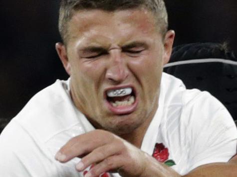 England’s Sam Burgess, centre is tackled by France’s Flugence Ouedraogo, left and France’s Yoann Maestri right, during an international friendly rugby match between England and France at Twickenham stadium in London, Saturday, Aug. 15, 2015. A series of friendly internationals are being held in advance of the upcoming Rugby World Cup that starts in September. (AP Photo/Alastair Grant)