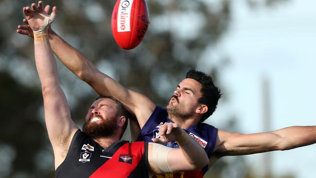 James Nolan and Sean Egan battle in the ruck. Picture: Hamish Blair