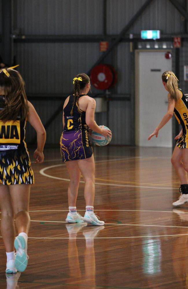 Netball action from QISSN 2024 in Townsville. St Josephs College v St Thomas More College