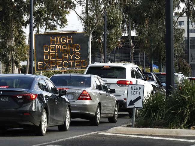 Long lines of cars wait for up to two hours at Highpoint Shopping Centre for a COVID-19 test.