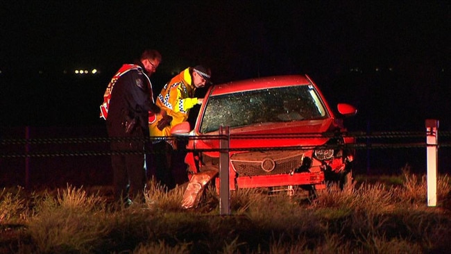 Police examine the Cruze involved the fatal accident at Ward Belt. Picture: 7NEWS