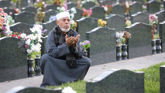 Sheik Taj Din al-Hilali tending graves in the Muslim section of Rookwood Cemetery. Photo: Bob Barker