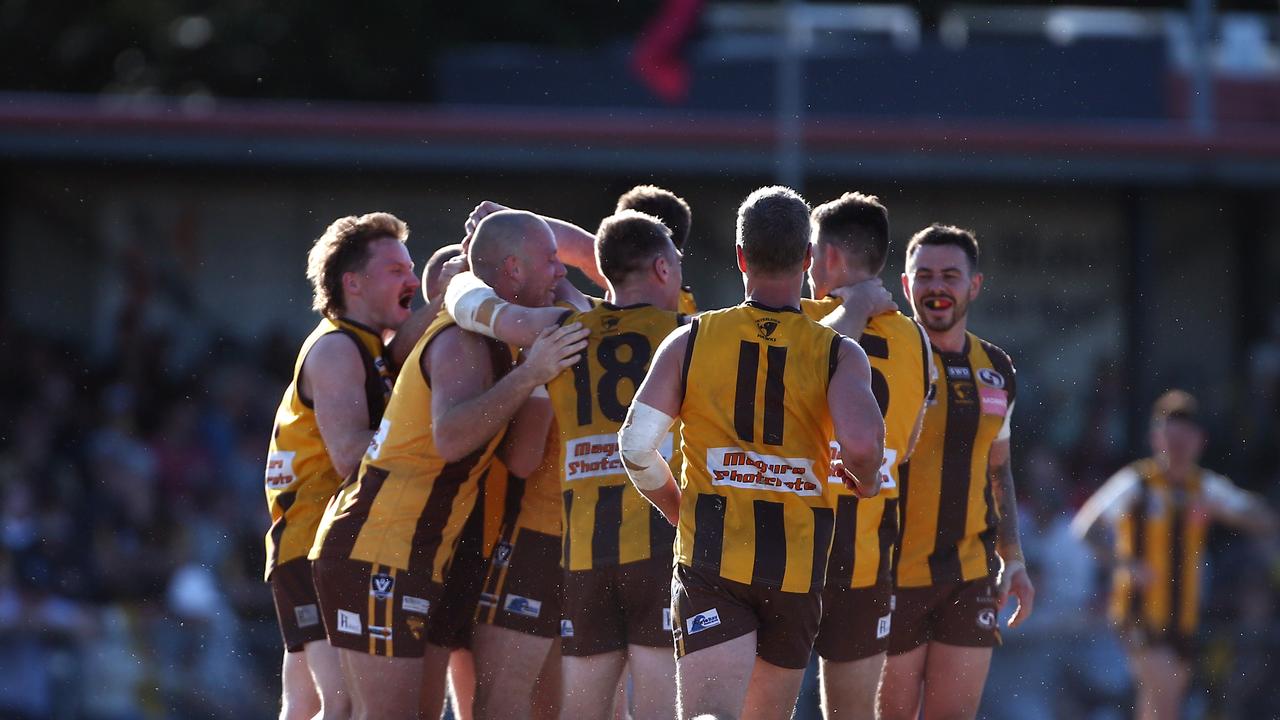 Inverleigh players celebrate a goal.