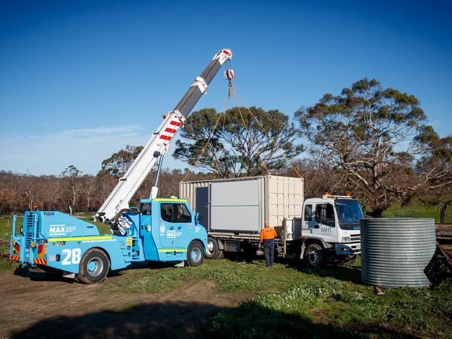 A pod being delivered to a bushfire victim. Picture: Matt Turner