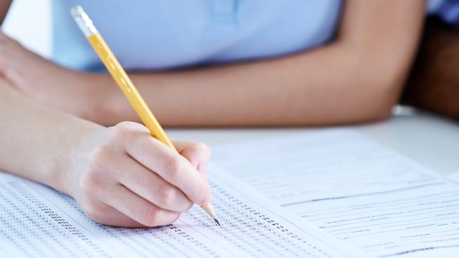 Unrecognizable girl taking exam