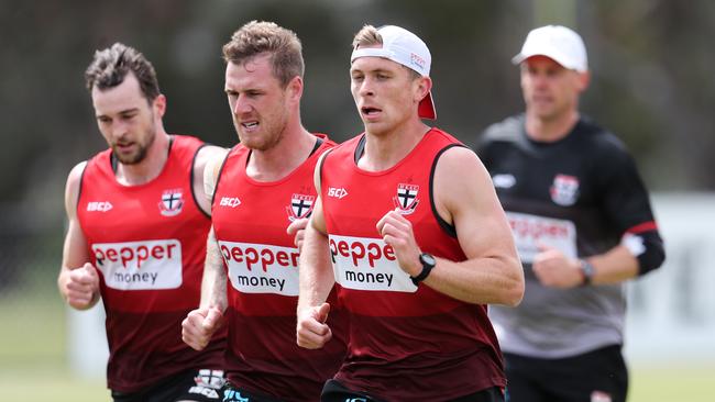 Seb Ross leads Tim Membery at St Kilda training. Pictuure: Michael Klein