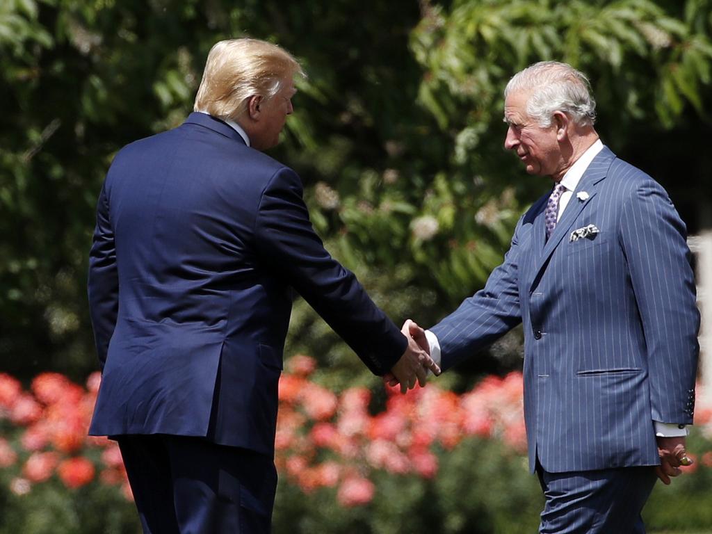 Prince Charles was the first to meet the President when he arrived on Marine One, in a break from royal protocol. Picture: AP Photo/Alex Brandon.