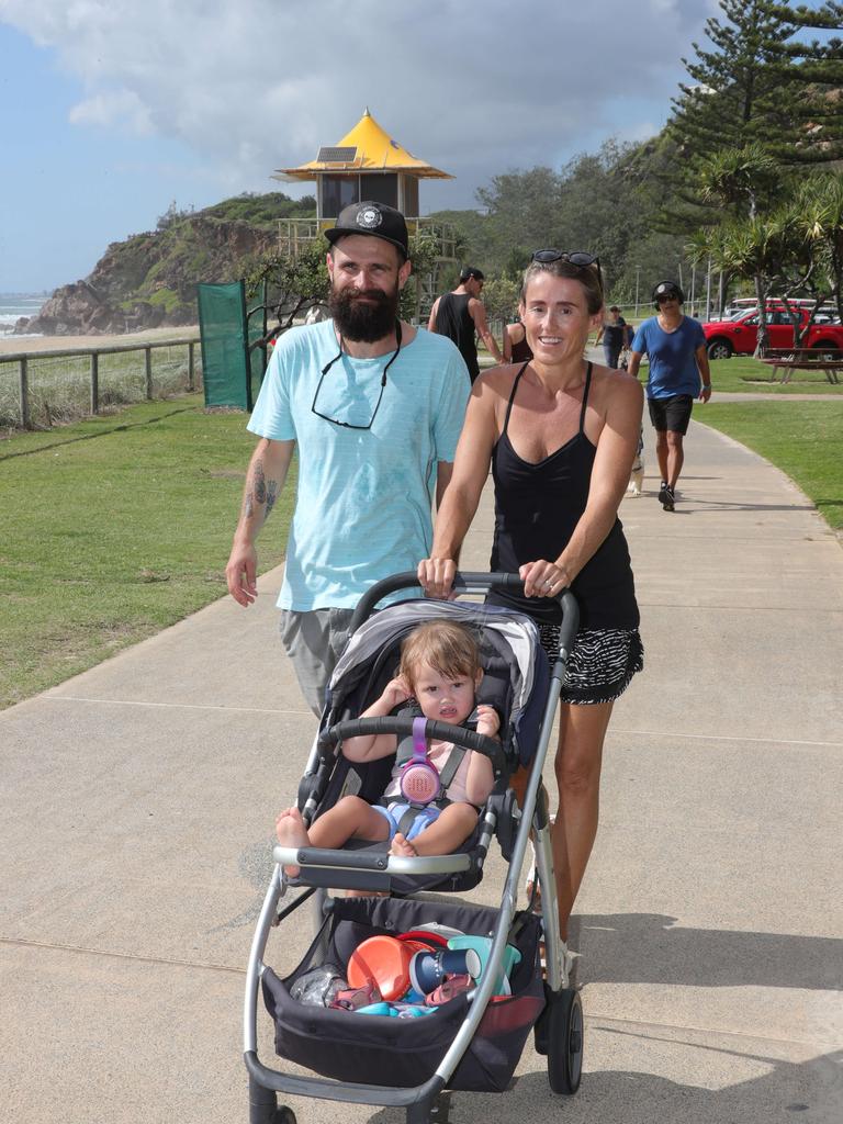 Jakub and Renee Jerzyniak with Margot 2. from Nobby beach. Picture Glenn Hampson