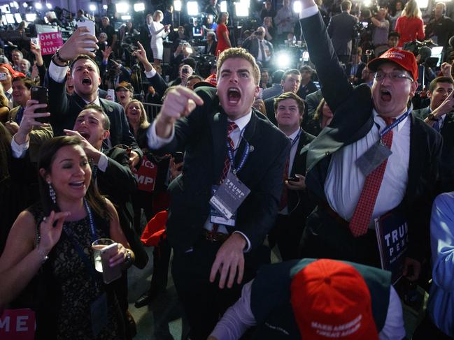 Supporters of Republican presidential candidate Donald Trump cheer as they watch election returns during an election night rally, Tuesday, Nov. 8, 2016, in New York. (AP Photo/ Evan Vucci)