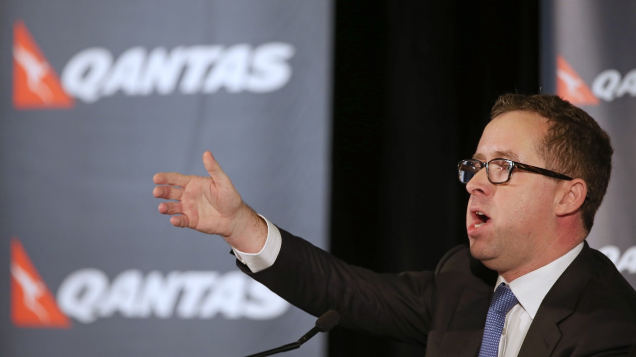 Qantas boss to remain at least one more year