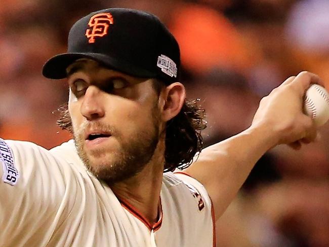 SAN FRANCISCO, CA - OCTOBER 26: Madison Bumgarner #40 of the San Francisco Giants pitches against the Kansas City Royals in the eithth inning during Game Five of the 2014 World Series at AT&T Park on October 26, 2014 in San Francisco, California. Rob Carr/Getty Images/AFP == FOR NEWSPAPERS, INTERNET, TELCOS & TELEVISION USE ONLY ==