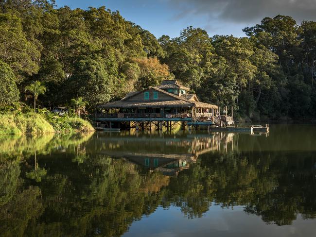 Framed by river-edge thicket, Dora’s childhood jungle home has been built jutting out over the water on the Coomera River. Picture: Vince Valitutti