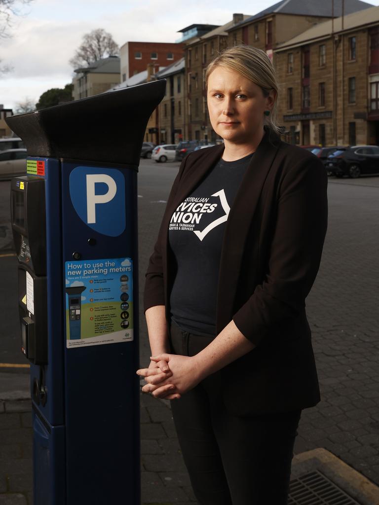 Sam Batchelor Tasmanian co-ordinator Australian Services Union with a parking meter in Salamanca Place. Hobart City Council parking officers say the city's parking management system is not working and they are stressed because they're issuing fines to people who have done nothing wrong. Picture: Nikki Davis-Jones